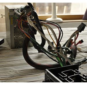 我可以在新计算机上重复使用旧PC的电源吗？