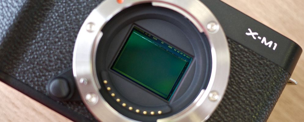 这是数码单反相机传感器对镜头的影响