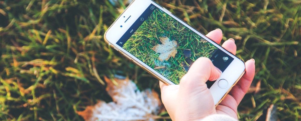 在iPhone上录制视频时如何拍照